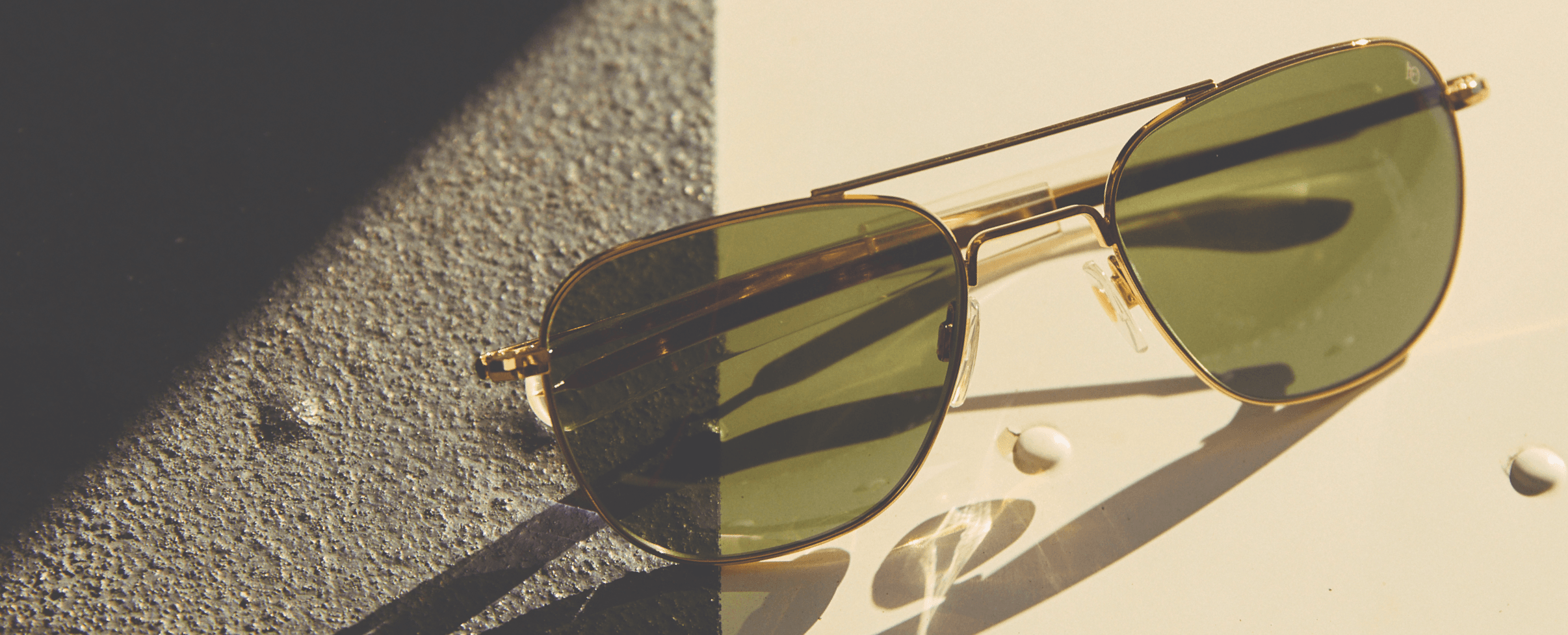 AO Sunglasses Pair and Headphones