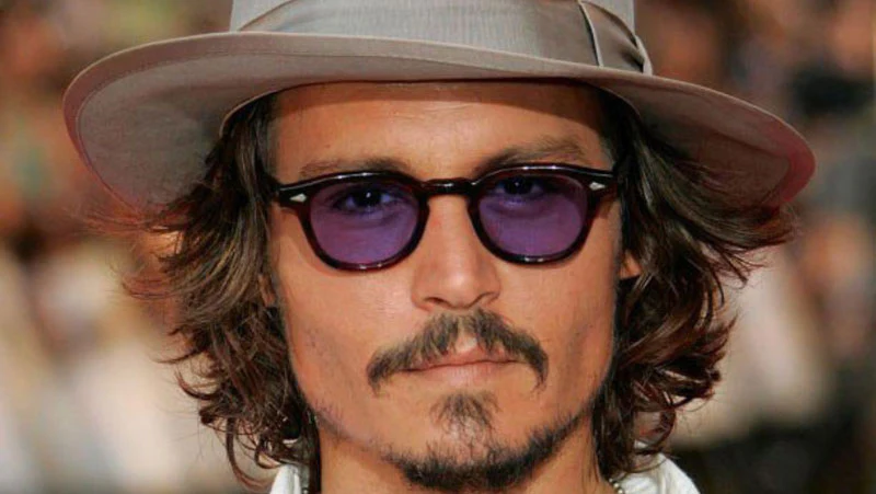 why does johnny depp wear sunglasses